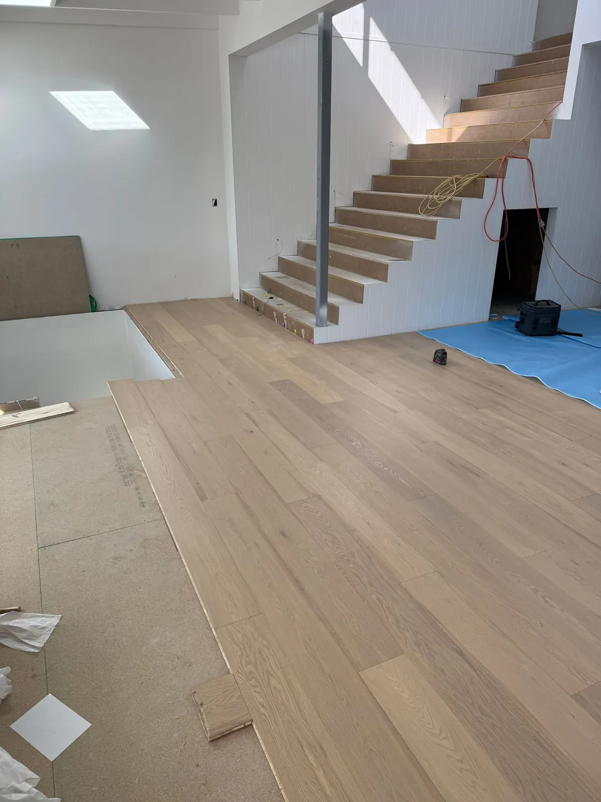 Oak flooring with floating staircase
